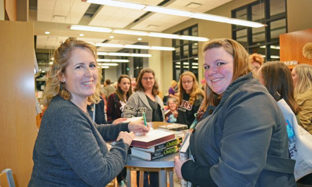 Best-selling author at library