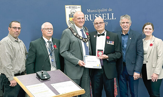 Russell Council presents a Citizen Recognition Award to Dr. Darrell Menard