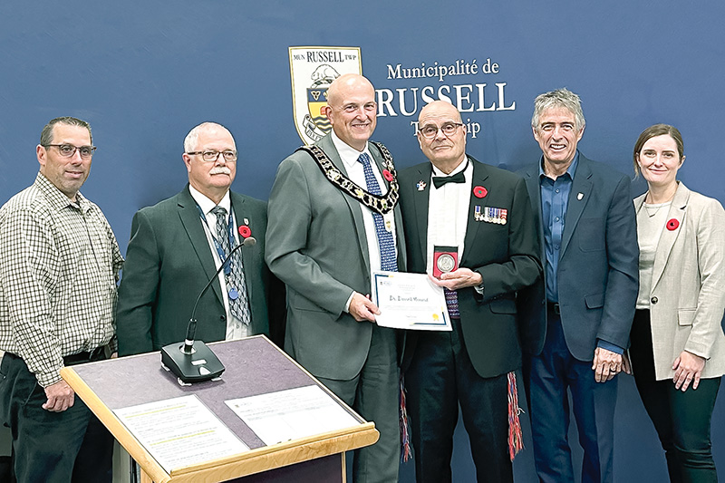 Russell Council presents a Citizen Recognition Award to Dr. Darrell Menard